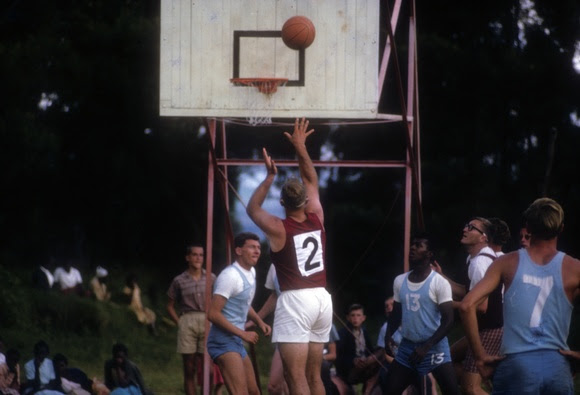 Men playing basketball