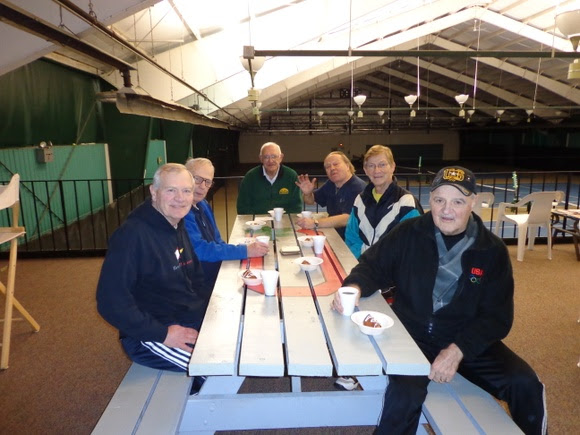 Tennis players sitting at a table